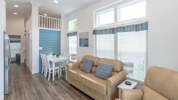 Cottage, 1 Bedroom, with Loft (Limited linens included) | Living room | Flat-screen TV, fireplace