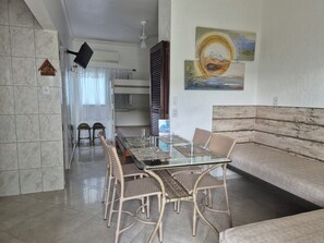 Apartment (04-B) | Living room | Flat-screen TV - Apartamentos Vilalba Ubatuba (Ubatuba)