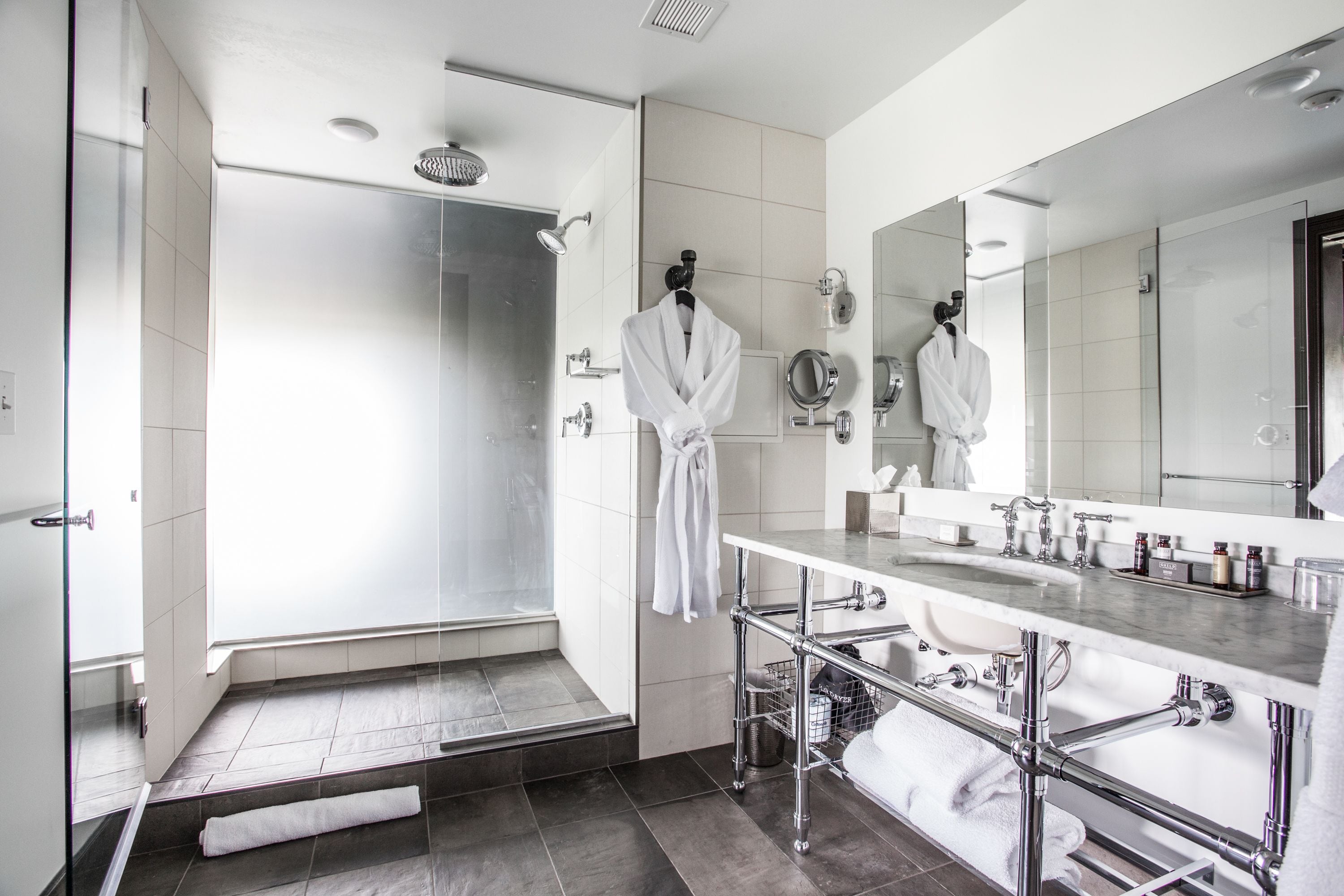 legacy ter suite | bathroom | shower, rainfall showerhead, free toiletries, hair dryer