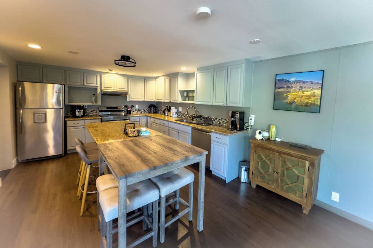 Mini-fridge, microwave, coffee/tea maker, dining tables
