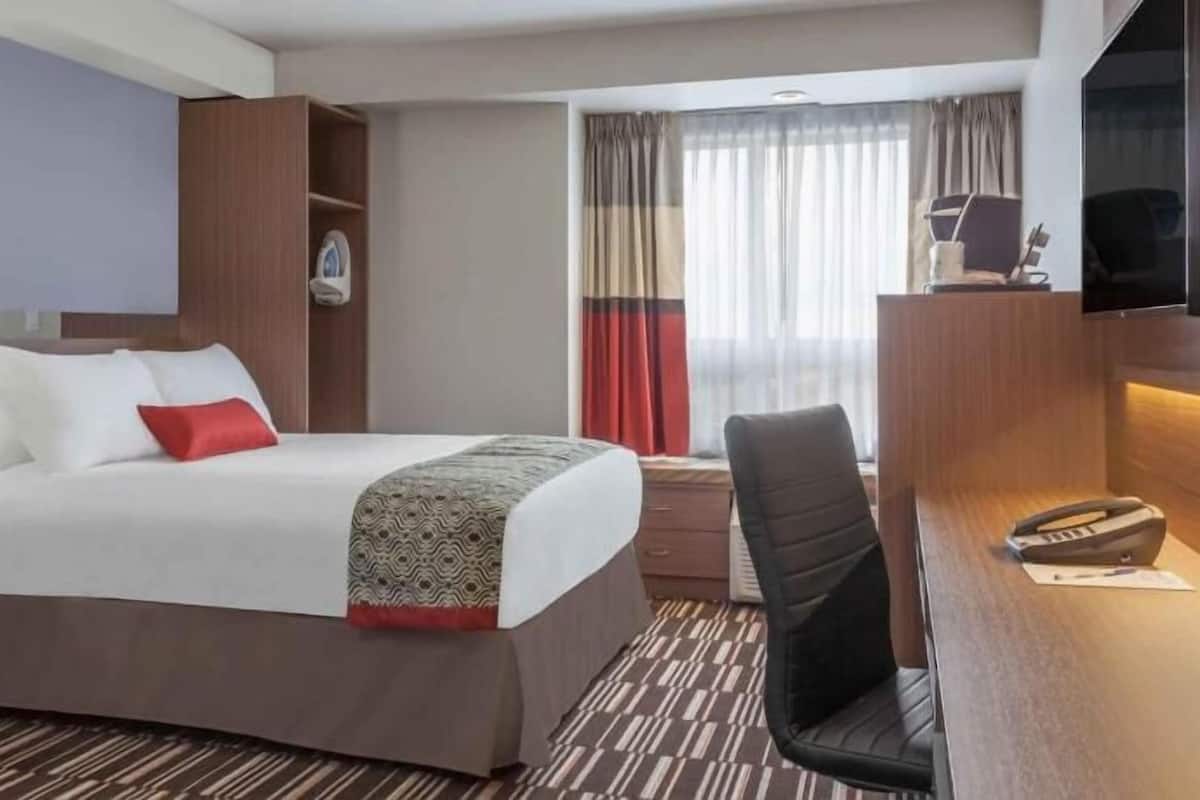 Desk, blackout drapes, iron/ironing board, free WiFi