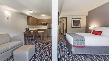 Studio Suite, 1 Queen Bed, Non Smoking | Desk, blackout curtains, iron/ironing board, free WiFi
