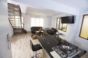 Appartement de base, 1 très grand lit | Cuisinette privée