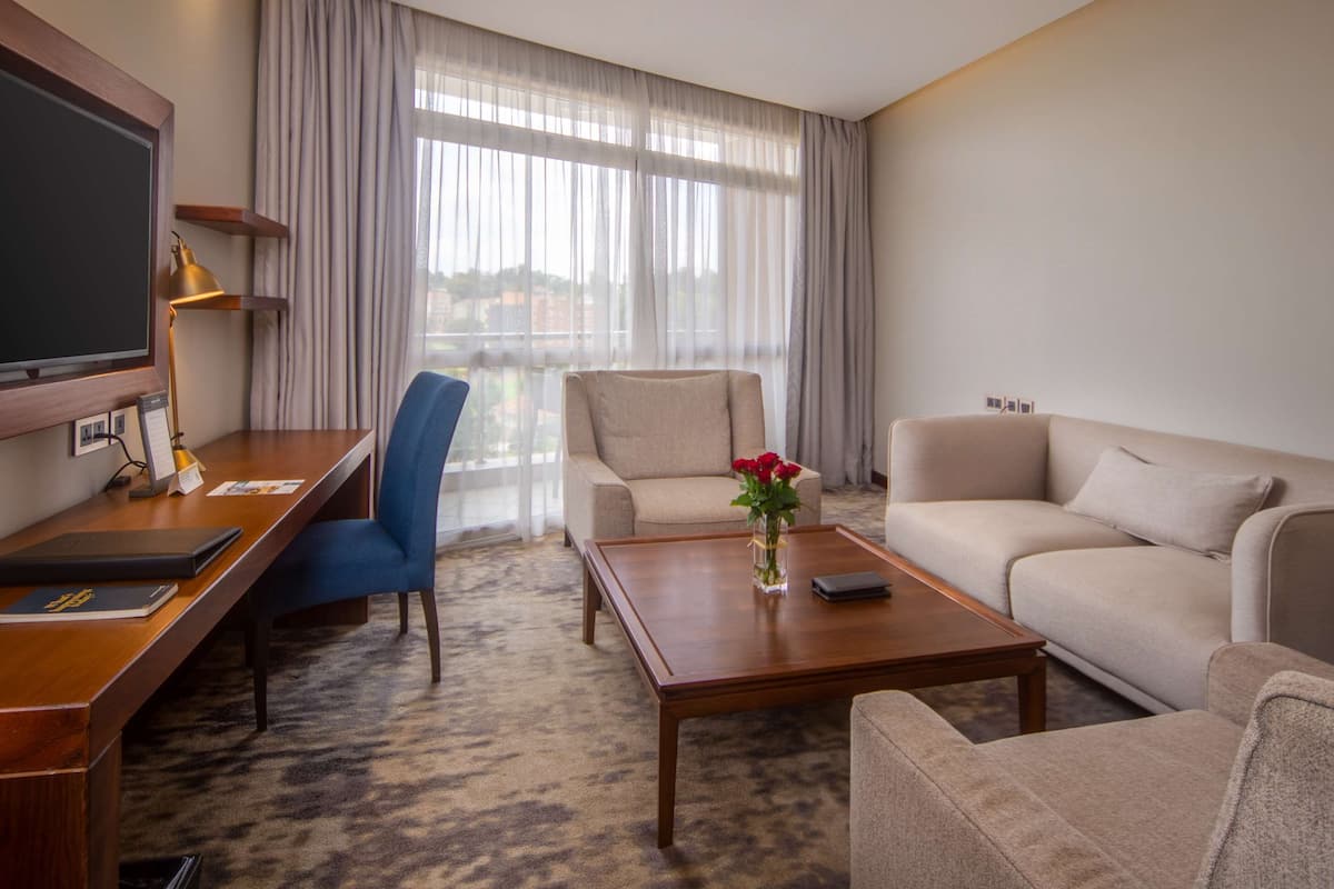 Suite, 1 King Bed, Balcony | Egyptian cotton sheets, premium bedding, pillow-top beds, minibar