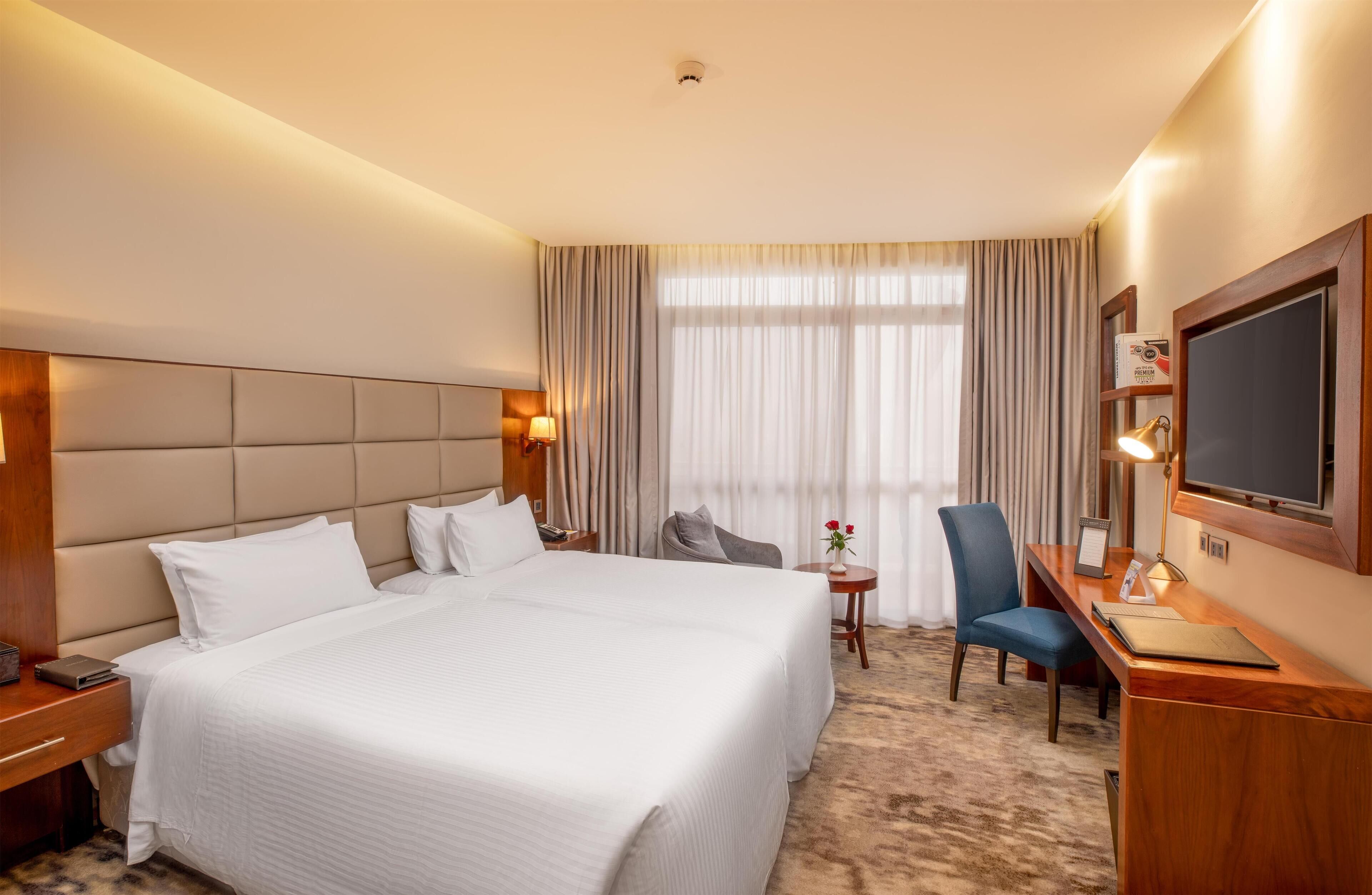 Deluxe Room, 2 Twin Beds, Balcony | Egyptian cotton sheets, premium bedding, pillowtop beds, minibar