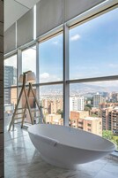 Presidential Suite, 1 King Bed | Bathroom | Combined shower/bathtub, free toiletries, hair dryer, towels