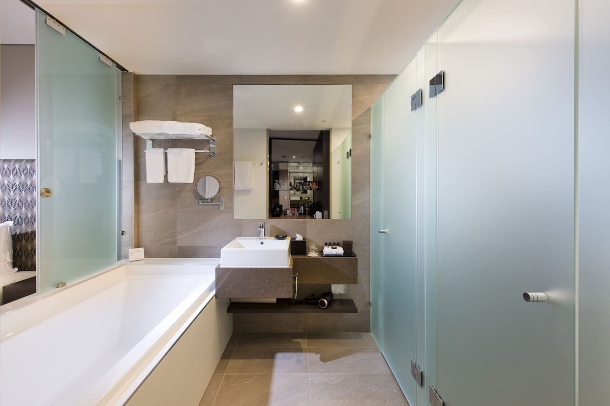 shower, designer toiletries, hair dryer, bathrobes