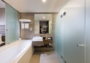 Shower, designer toiletries, hair dryer, bathrobes