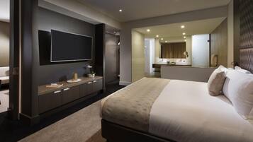 Suite ejecutiva, 1 cama de matrimonio grande | Minibar, caja fuerte, escritorio y sistema de insonorización