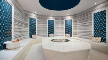 Massages aux pierres chaudes, massages des tissus profonds