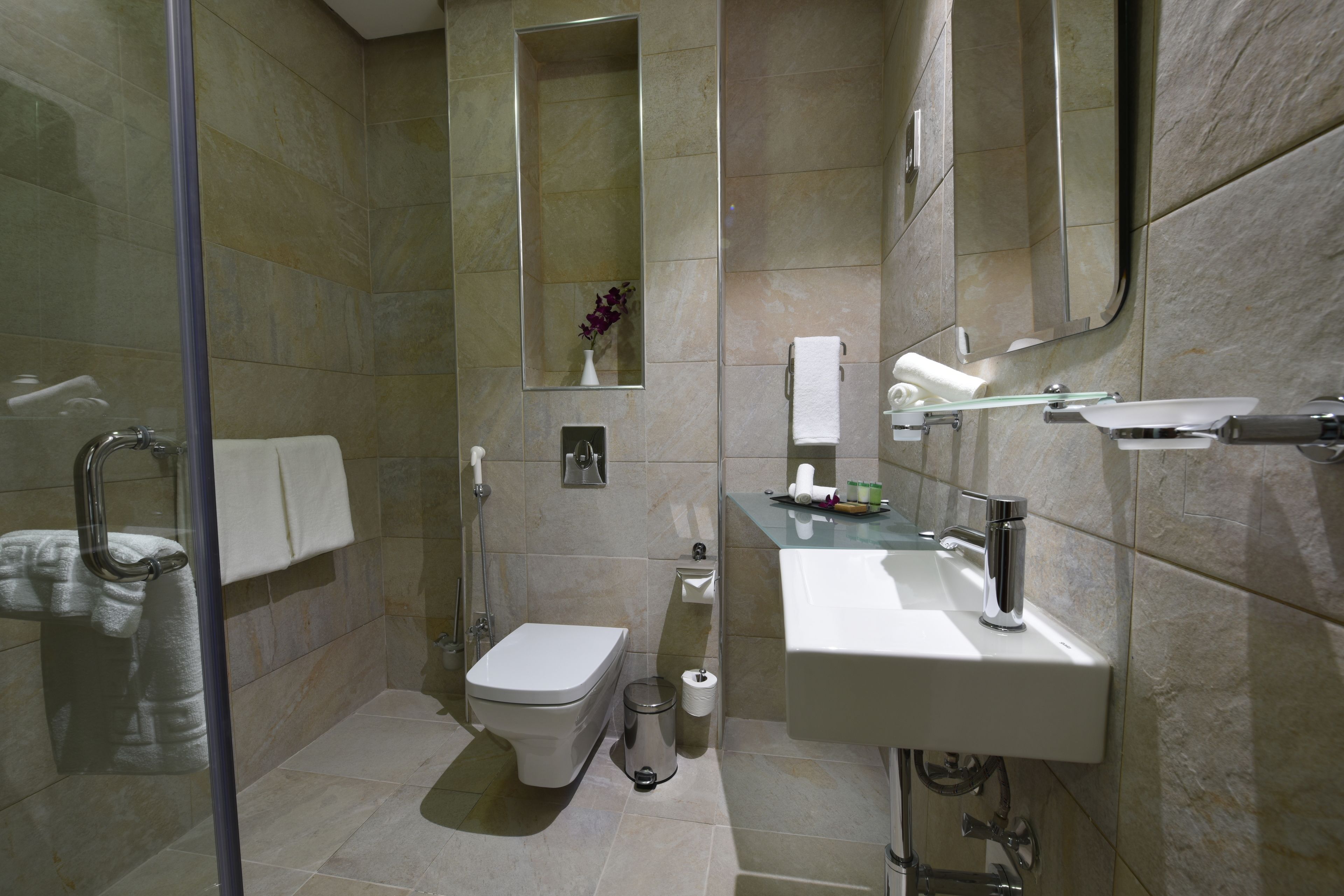 free toiletries, hair dryer, slippers, towels