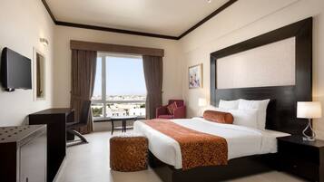 In-room safe, desk, laptop workspace, iron/ironing board