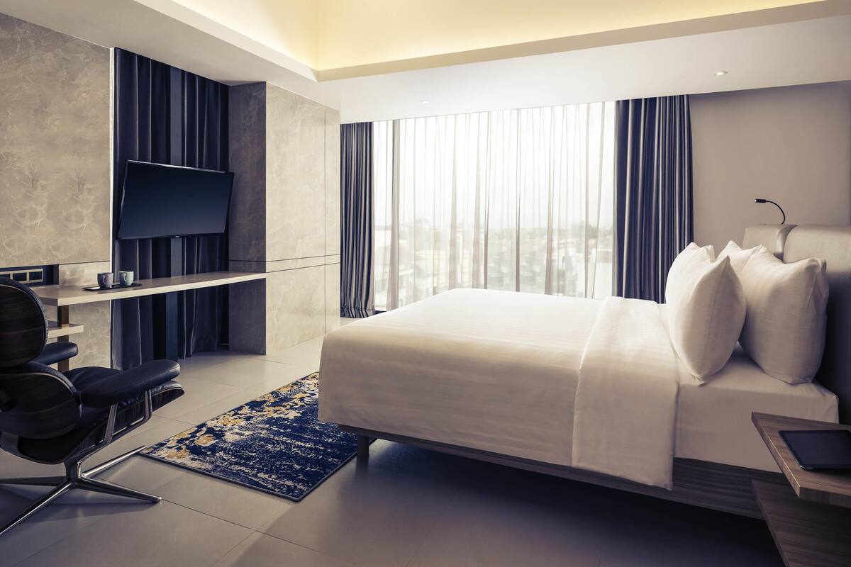 Suite ejecutiva, 1 cama Queen size | Minibar, caja de seguridad en la habitación y escritorio