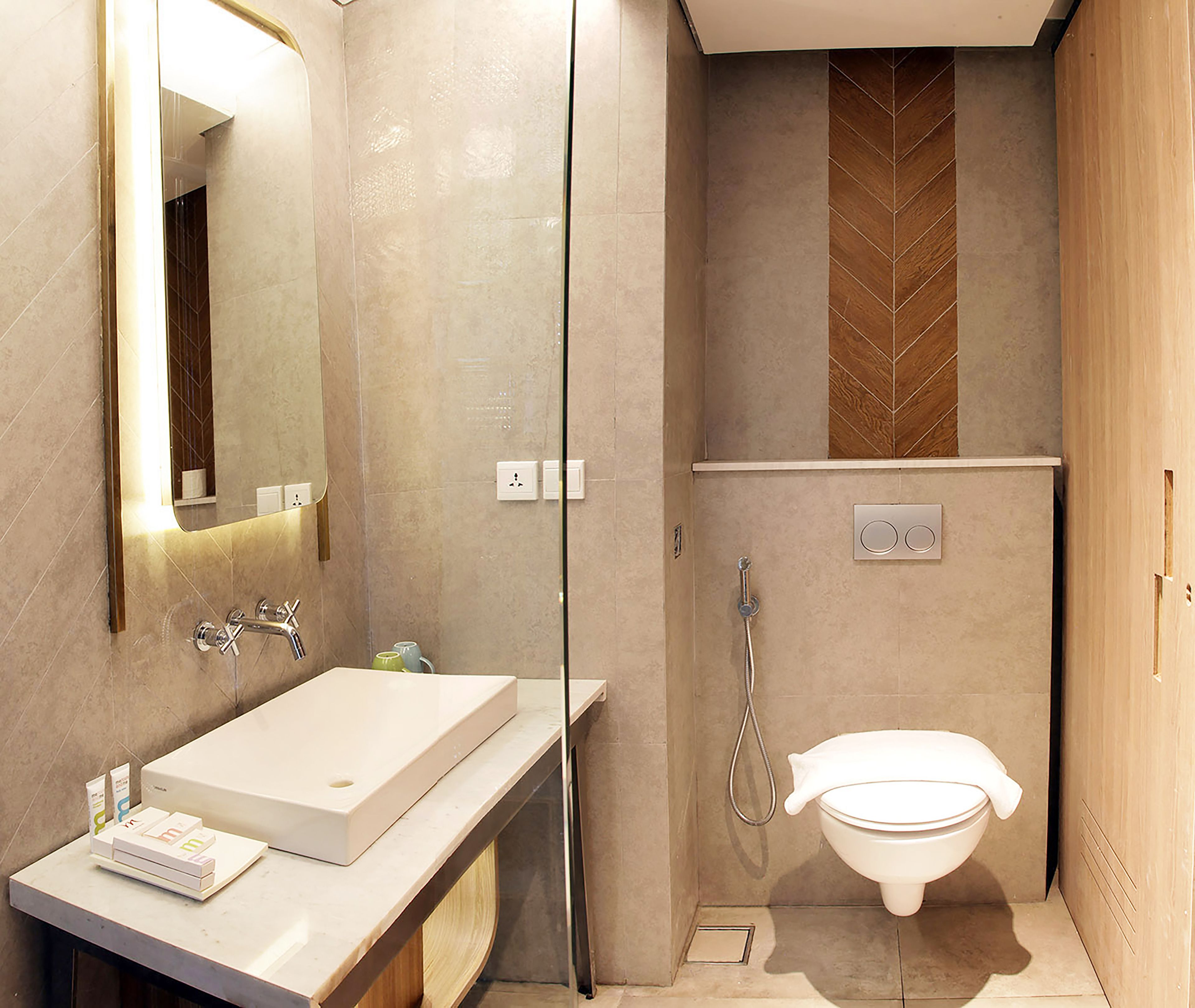 Shower, eco-friendly toiletries, hair dryer, slippers
