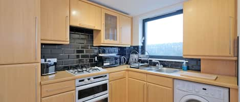 Apartment, 2 Bedrooms | Private kitchen | Full-sized fridge, microwave, oven, stovetop