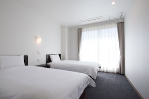 Habitación estándar con 2 camas individuales | Escritorio, sistema de insonorización, wifi gratis