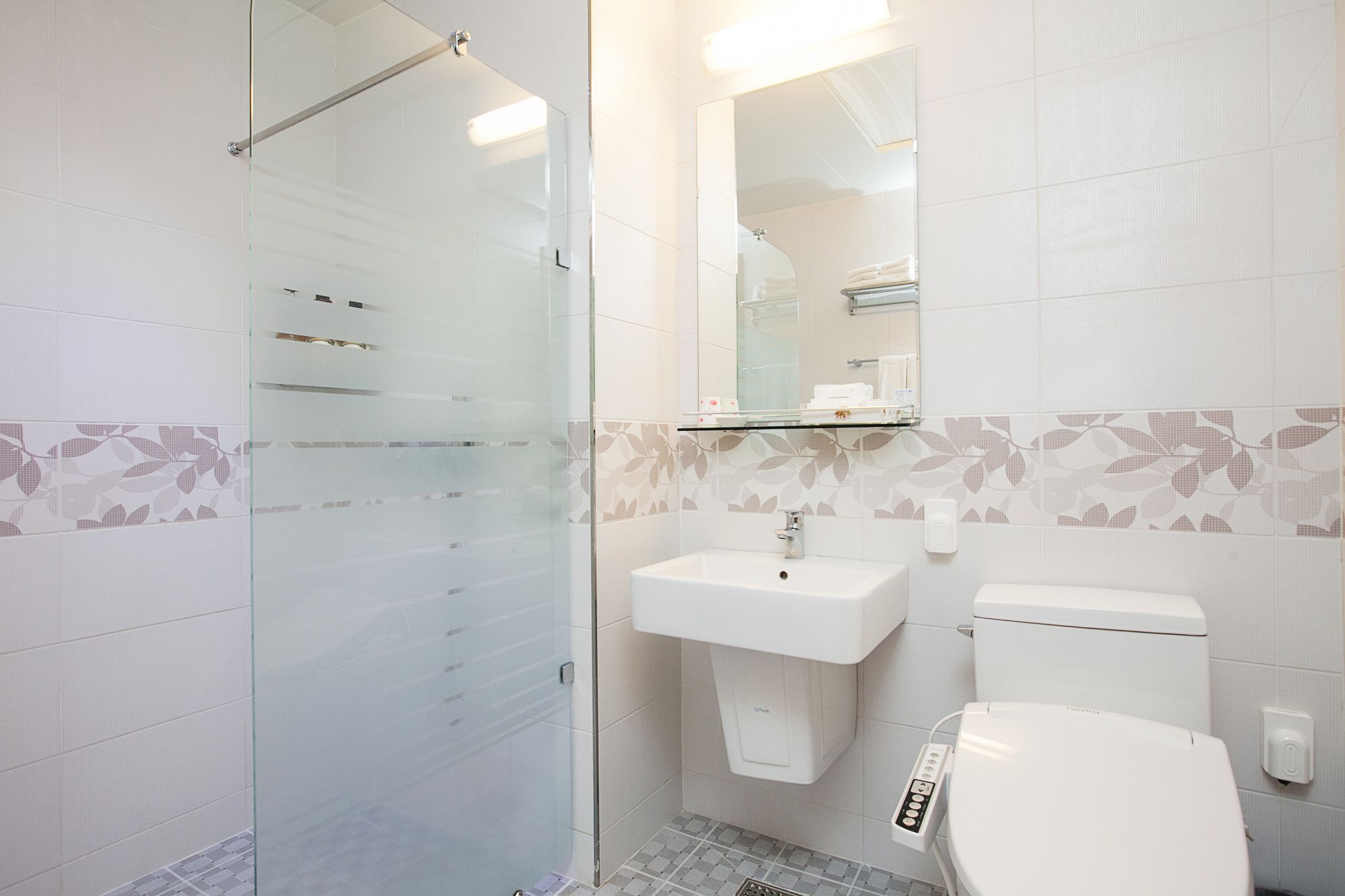 shower, slippers, bidet, towels