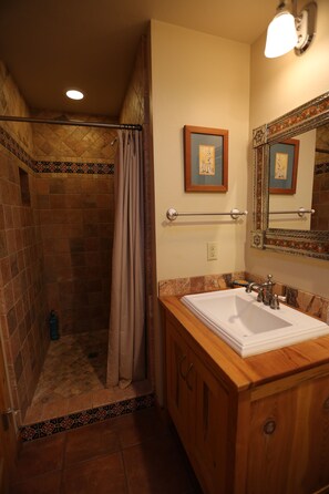 Combined shower/bathtub, hair dryer, towels, soap