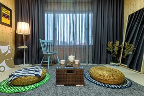 Entire House | Living room | 49-inch flat-screen TV with cable channels, TV - Muumoon Stay (Seogwipo)