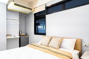 Camera Deluxe con letto matrimoniale o 2 letti singoli | 1 camera, una scrivania, Wi-Fi gratuito, lenzuola