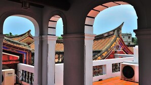 A traditional architectural structure with arched walkways and a tiled roof. - Feng Mao Lin Zh (Jincheng)
