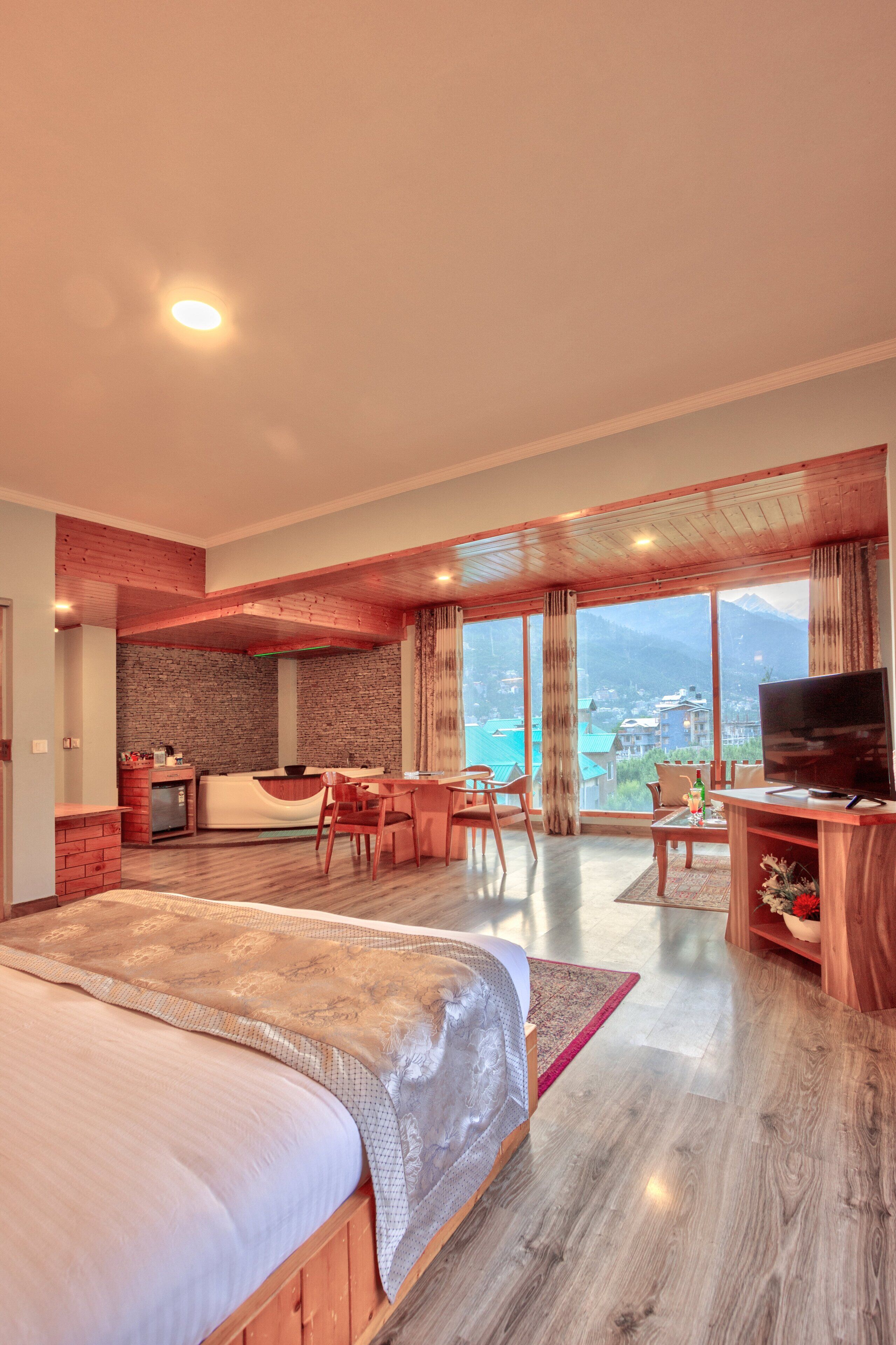 Presidential Suite | Living area | 42-inch LCD TV with satellite channels, TV, heated floors