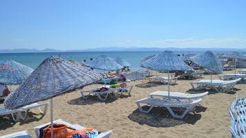 Private beach, sun-loungers, beach umbrellas, beach bar