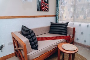 Deluxe Double Room | Minibar, in-room safe, desk, laptop workspace - Arusha Giraffe Lodge (Arusha)