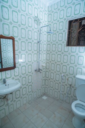 Shower, free toiletries, slippers, towels