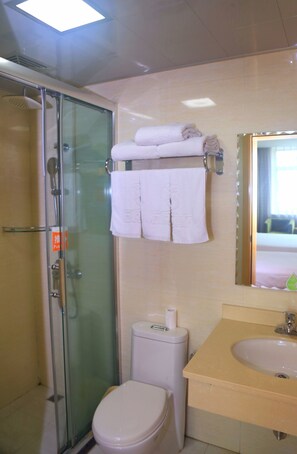Shower, free toiletries, hair dryer, slippers