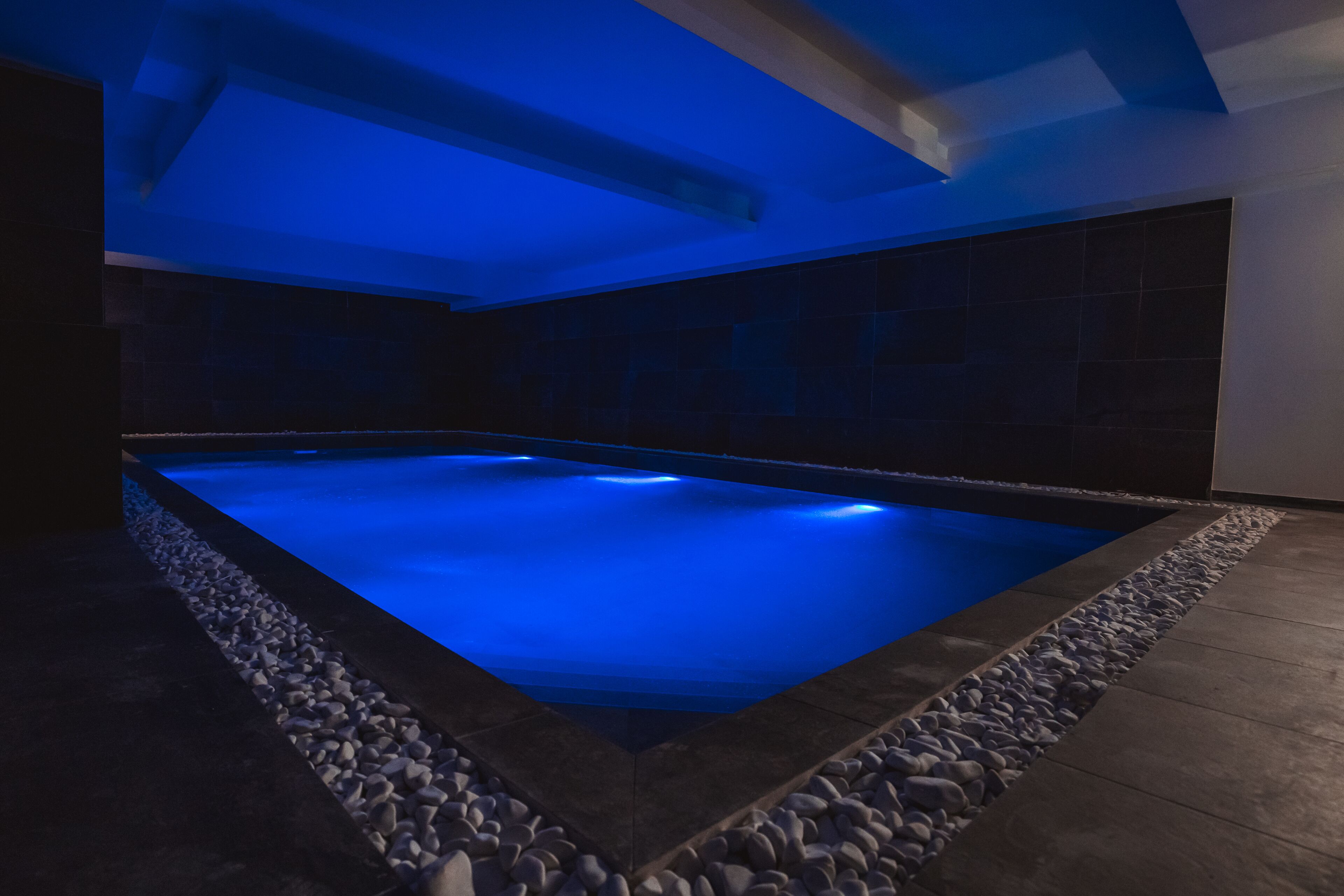 indoor pool, seasonal outdoor pool, pool loungers