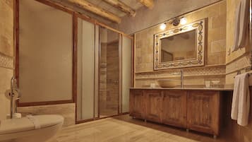Deluxe Room | Bathroom | Hair dryer, slippers, towels, soap