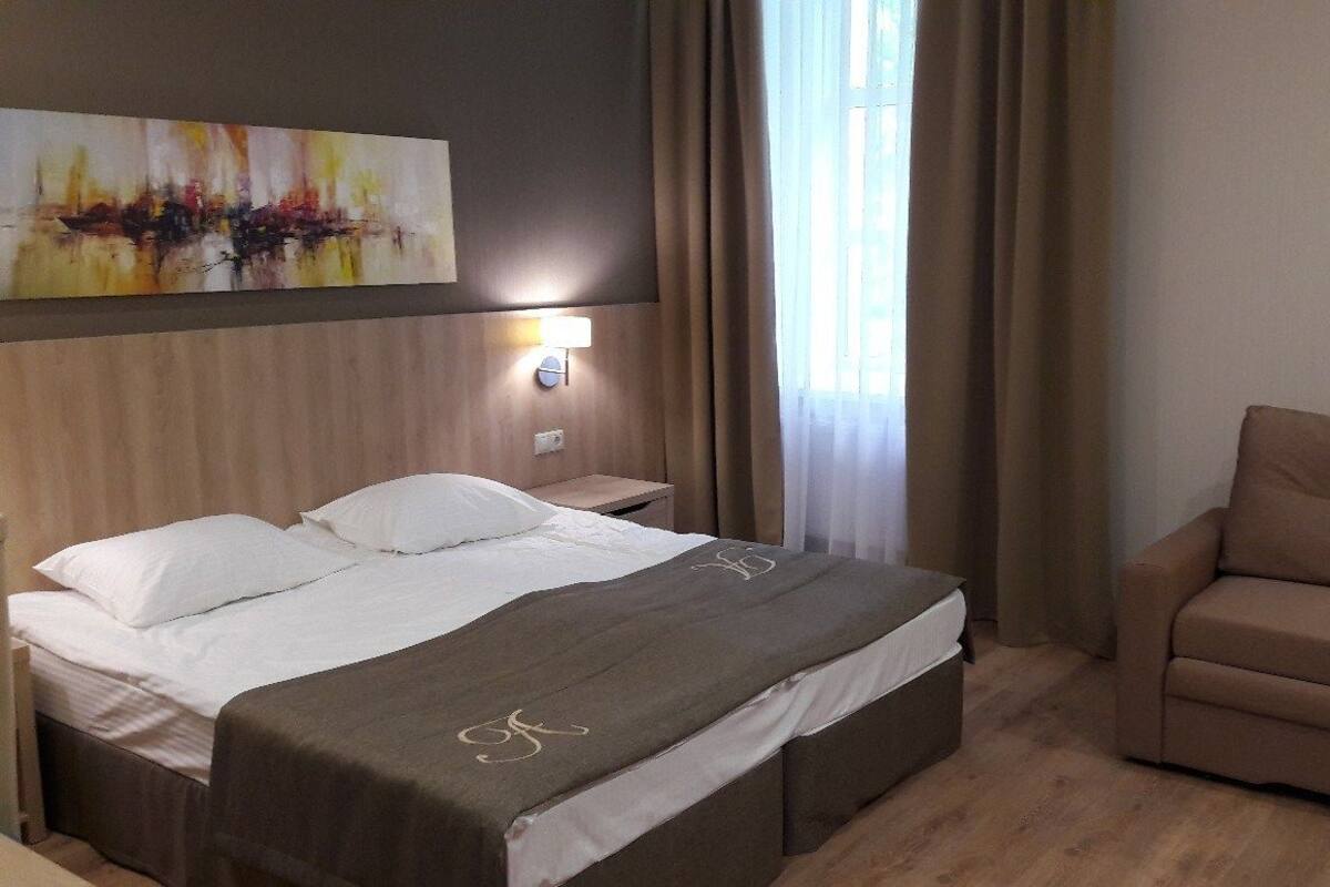 Premium Suite (Treatment included) | Minibar, iron/ironing board, free WiFi, bed sheets