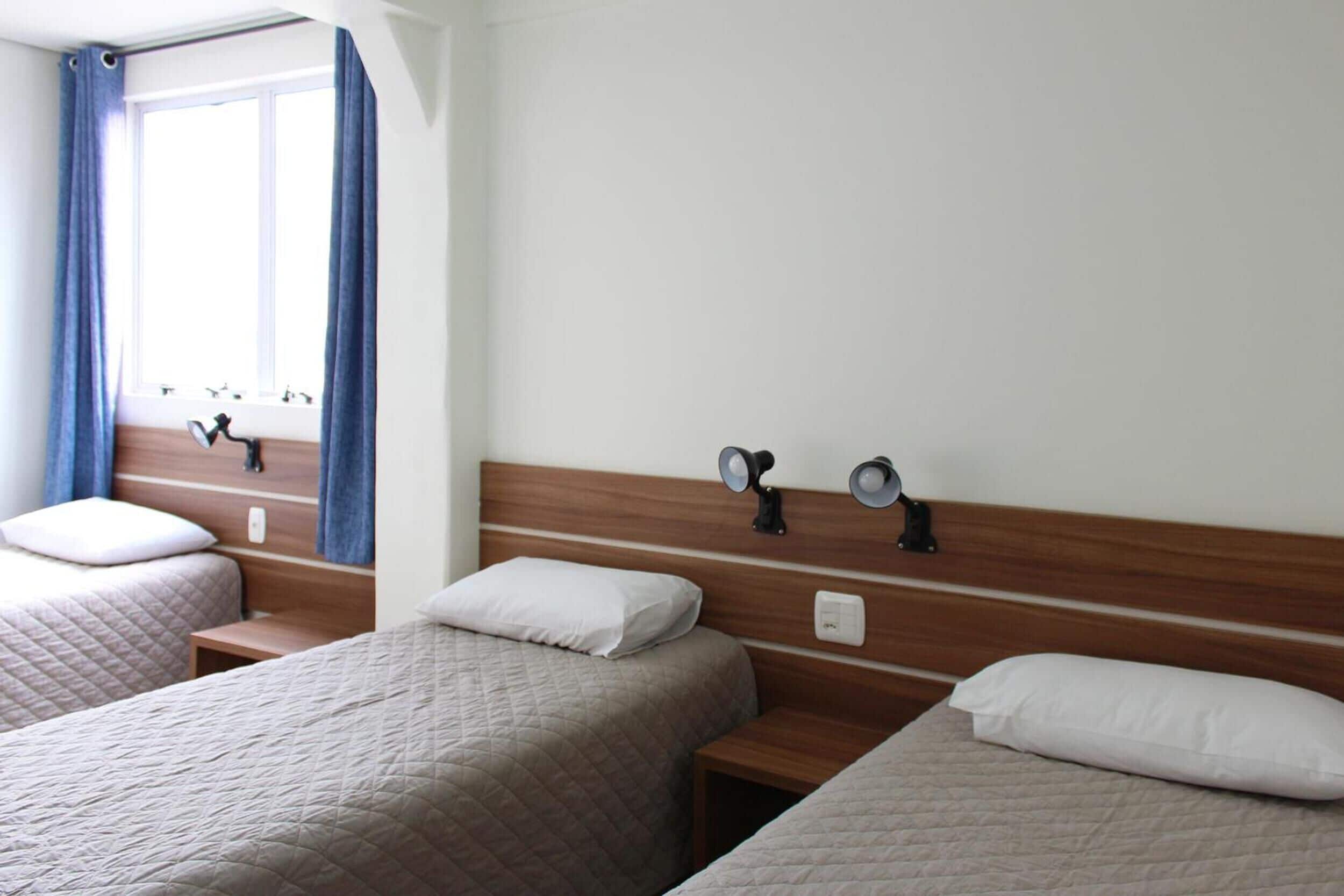 deluxe triple room | 1 bedroom, minibar, desk, blackout curtains