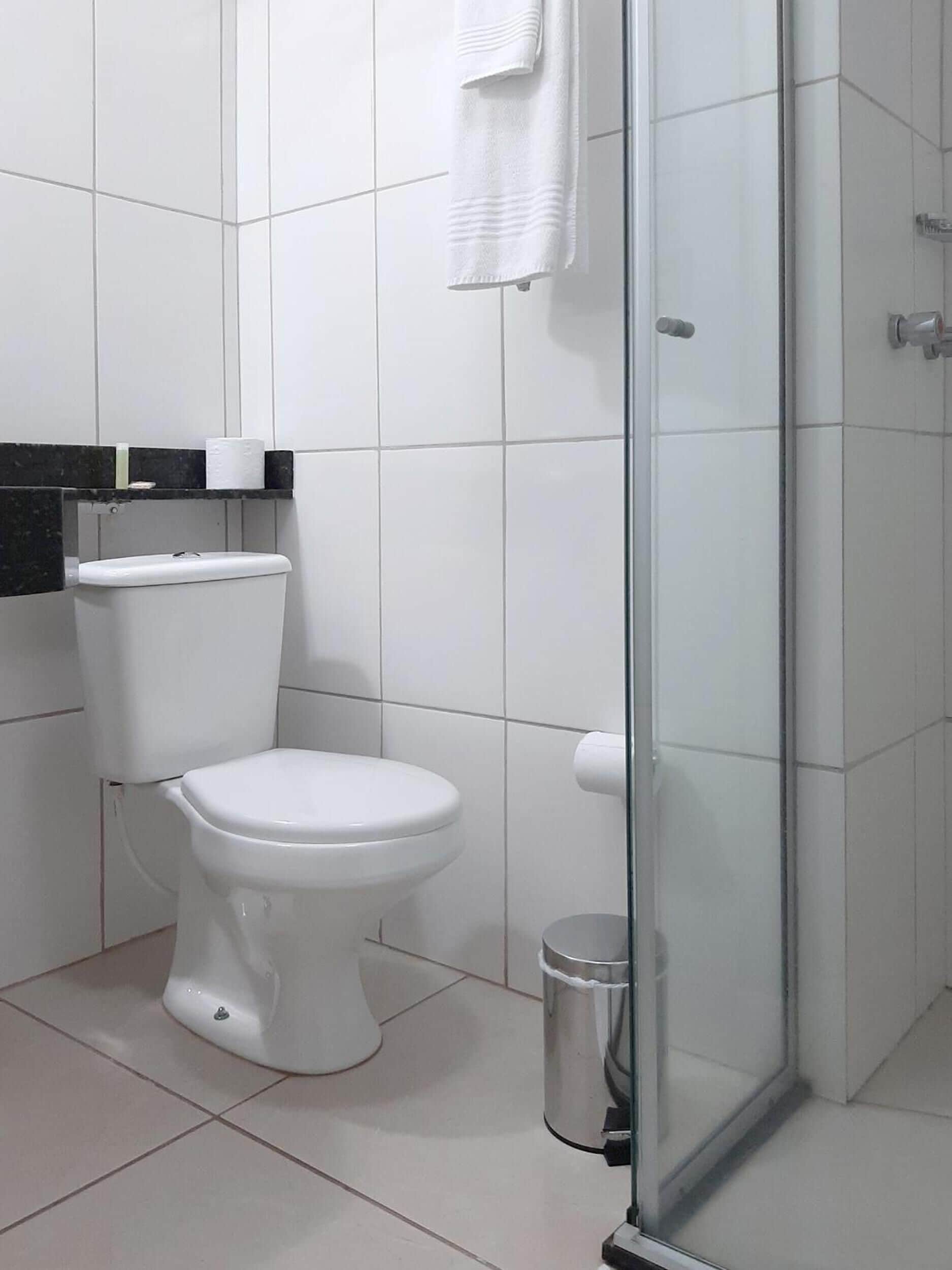 deluxe double room single use | bathroom | shower, rainfall showerhead, designer toiletries, hair dryer