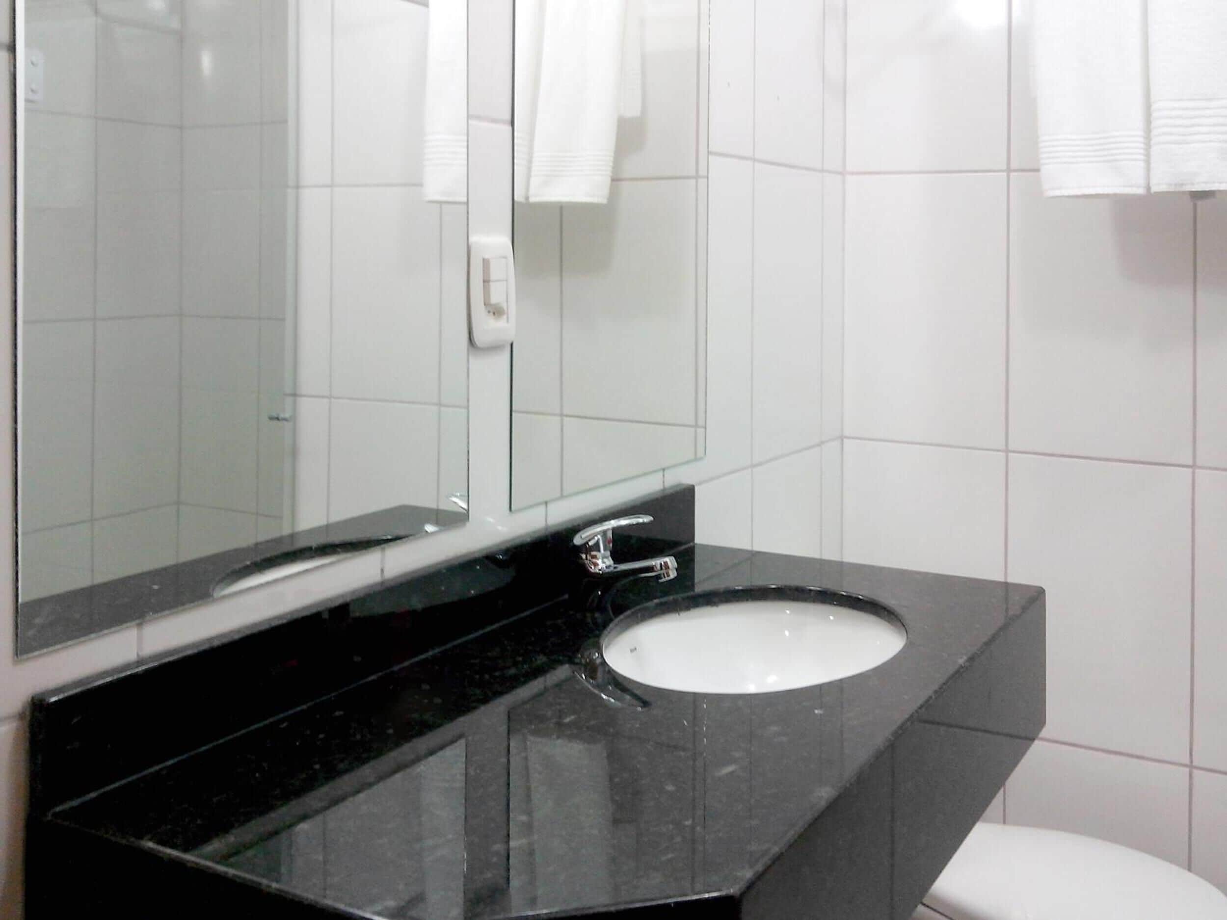 deluxe triple room | bathroom | shower, rainfall showerhead, designer toiletries, hair dryer