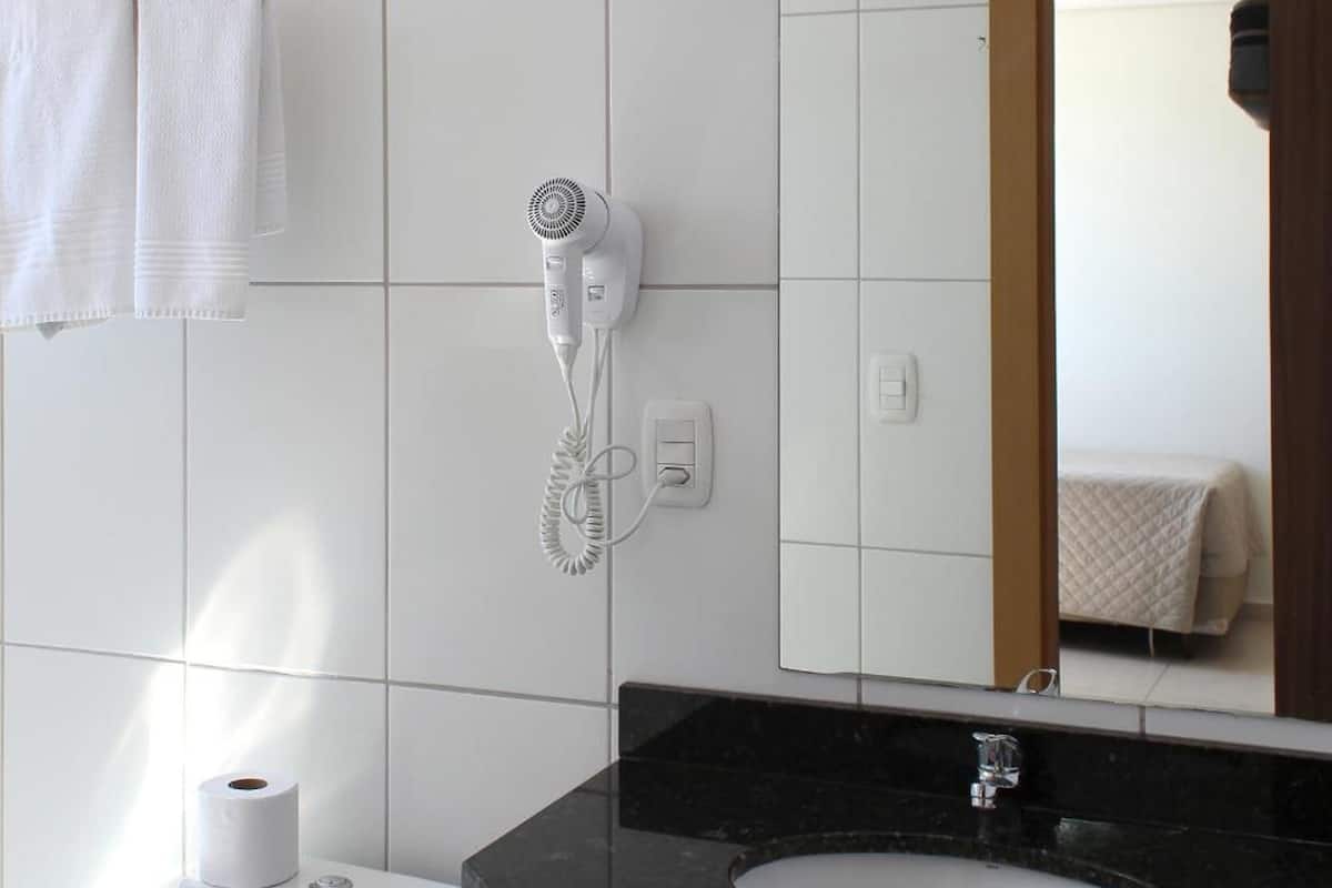 deluxe triple room | bathroom | shower, rainfall showerhead, designer toiletries, hair dryer
