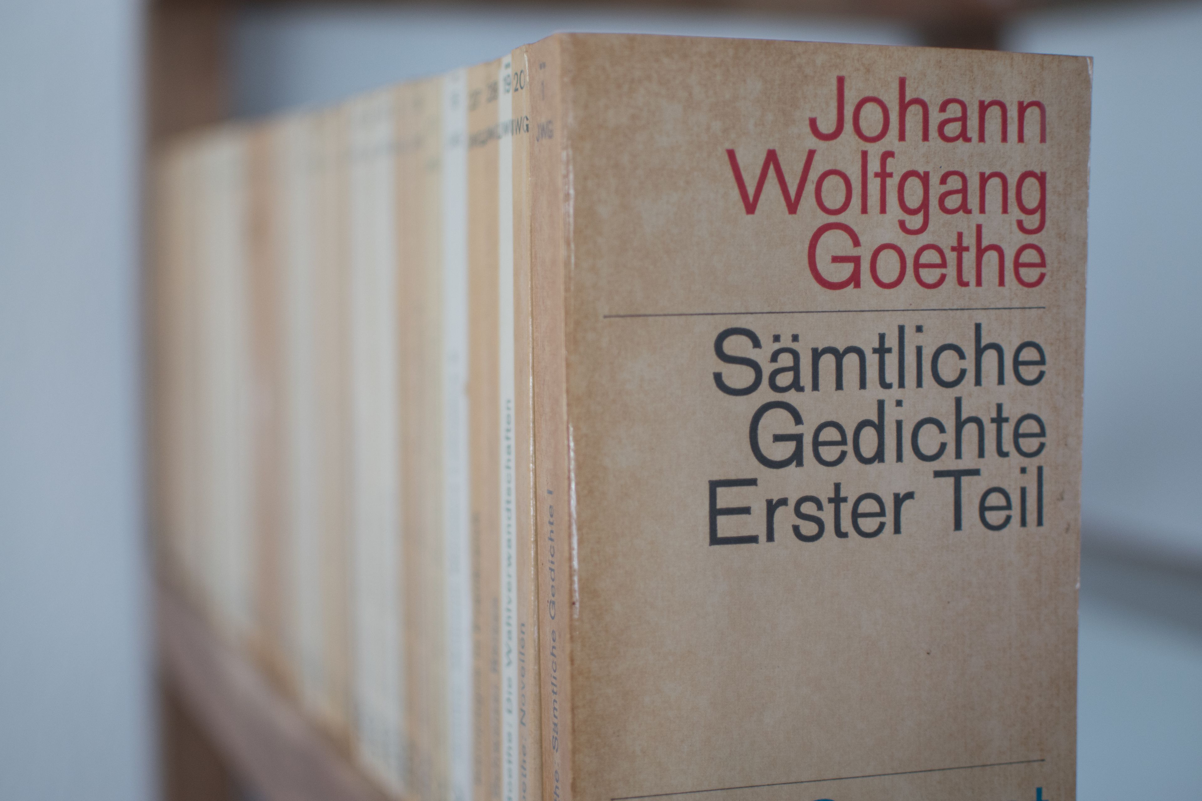 A book titled 'Sämmtliche Gedichte Erster Teil' by Johann Wolfgang Goethe.