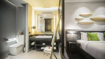 Shower, designer toiletries, hair dryer, bathrobes