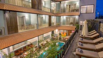 Outdoor pool, pool umbrellas, pool loungers