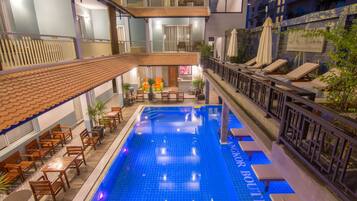 Outdoor pool, pool umbrellas, pool loungers