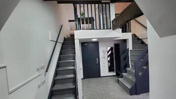 2 Bed Suite with Balcony | Living area | 32-inch LED TV with satellite channels, TV