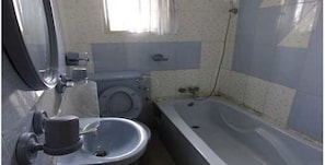 Bathtub, deep-soaking bathtub, towels