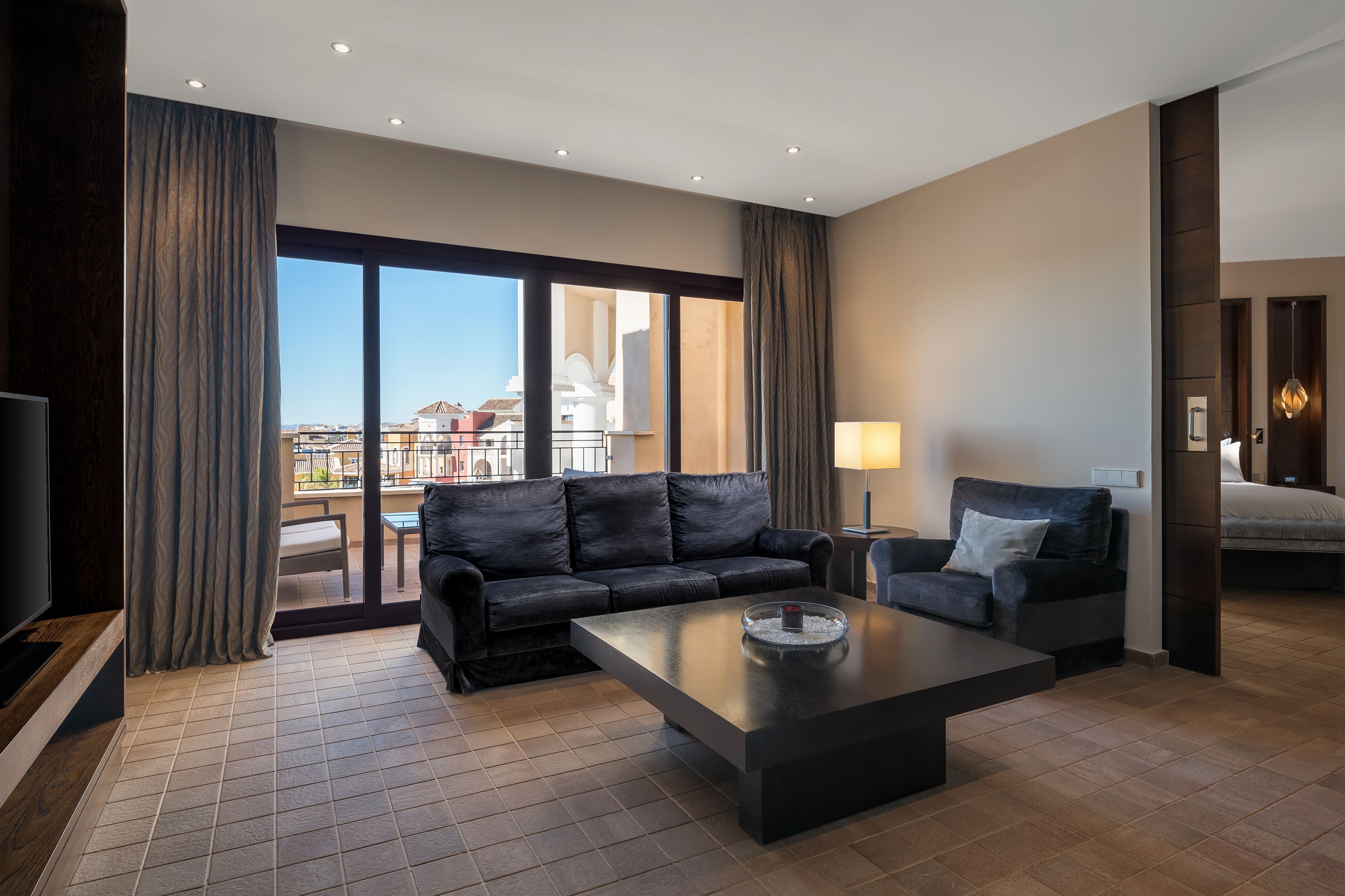 Deluxe Suite, 1 Bedroom | Living area | Flat-screen TV