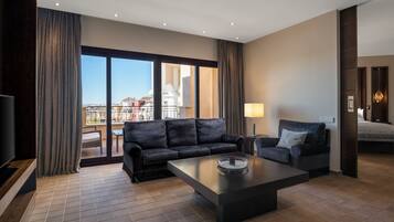 Deluxe Suite, 1 Bedroom | Living area | Flat-screen TV
