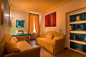 Apartment, 3 Bedrooms | Living area | Flat-screen TV