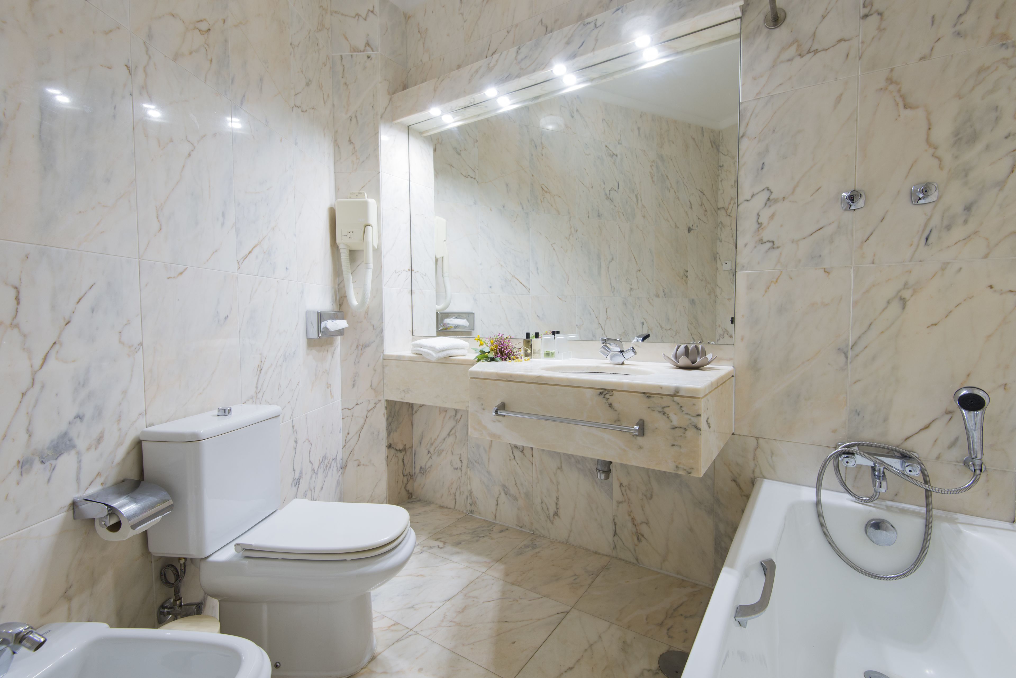 free toiletries, hair dryer, towels, shampoo