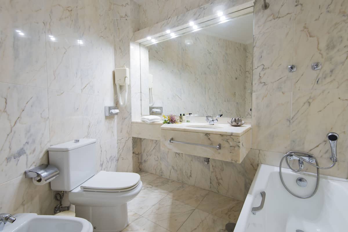 free toiletries, hair dryer, towels, shampoo