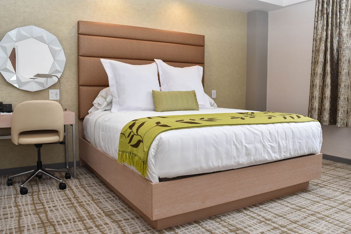 Tower Cozy King | Premium bedding, in-room safe, desk, laptop workspace