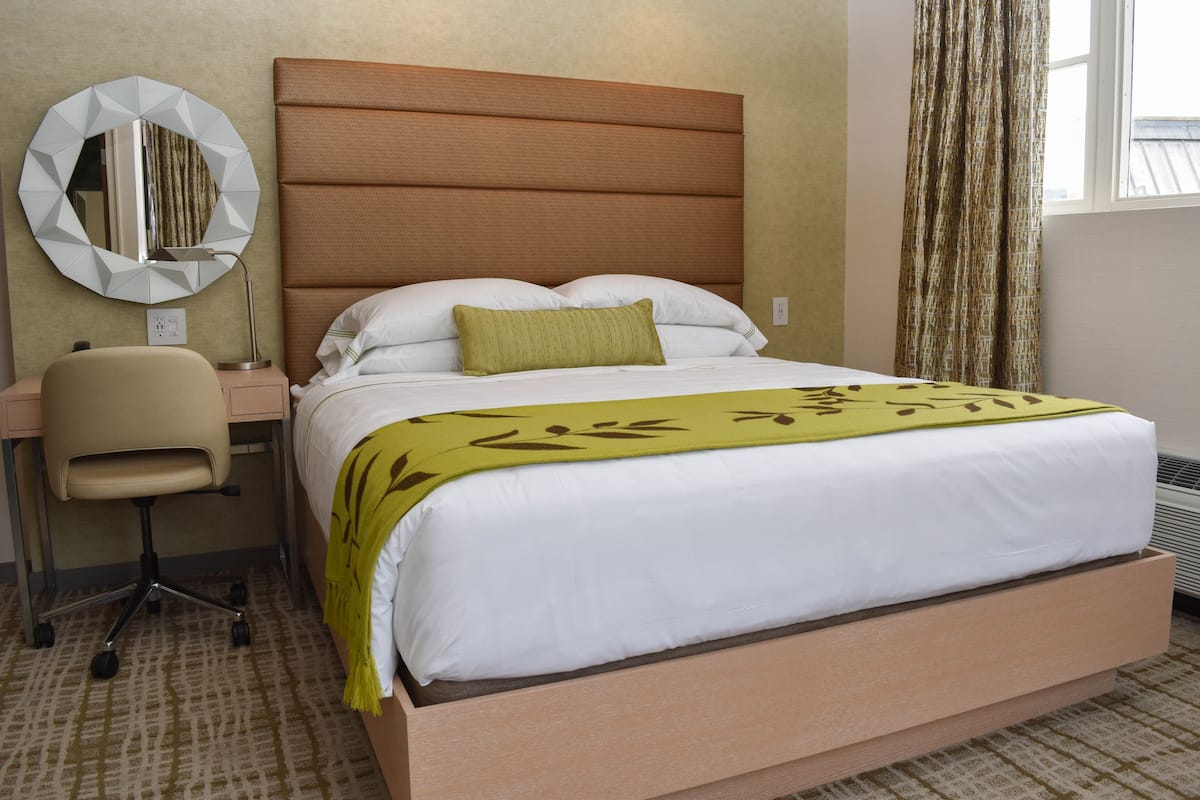 Tower Cozy Corner King | Premium bedding, in-room safe, desk, laptop workspace